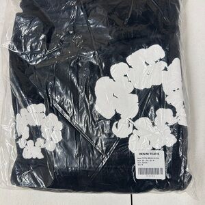 Denim tears Black  Hoodie  with White Floral Design